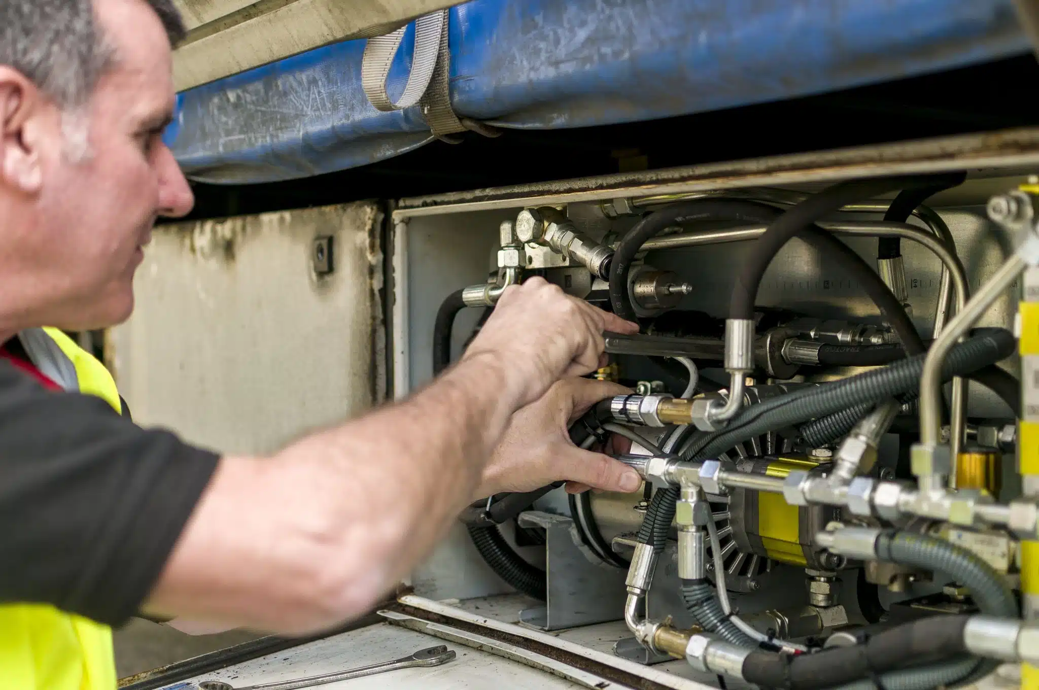 Engineer inspecting commercial vehicle parts